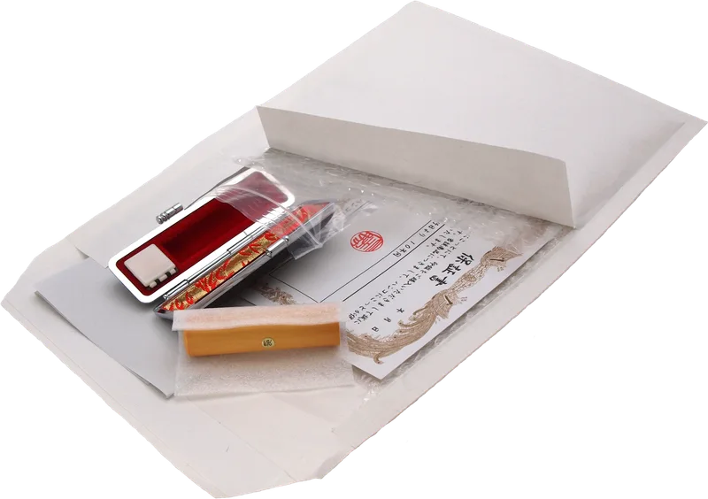 What arrives: the seal in a soft sleeve, a leather case, and a guarantee certificate in a padded envelope